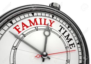 12727918-family-time-concept-clock-closeup-isolated-on-white-background-with-red-and-black-words-stock-photo